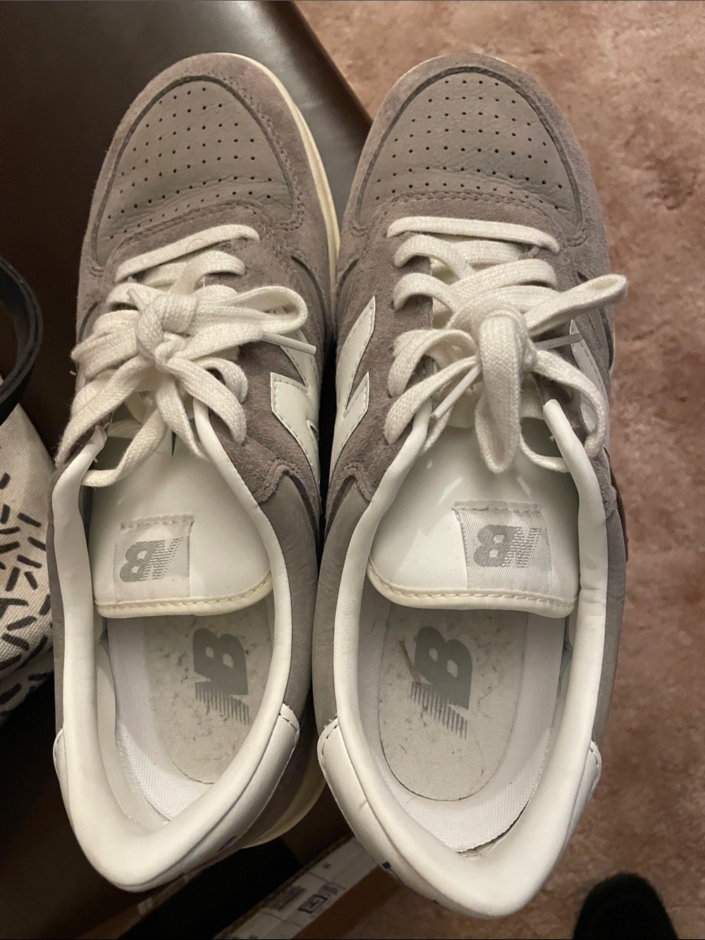 Like new Men’s New Balance Gray and White Suede Low-Top Sneakers